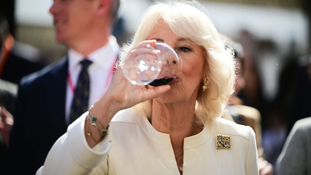 Queen Camilla enjoys the fruits of Italian hospitality as she tucks into local tipples and has a go at making pasta