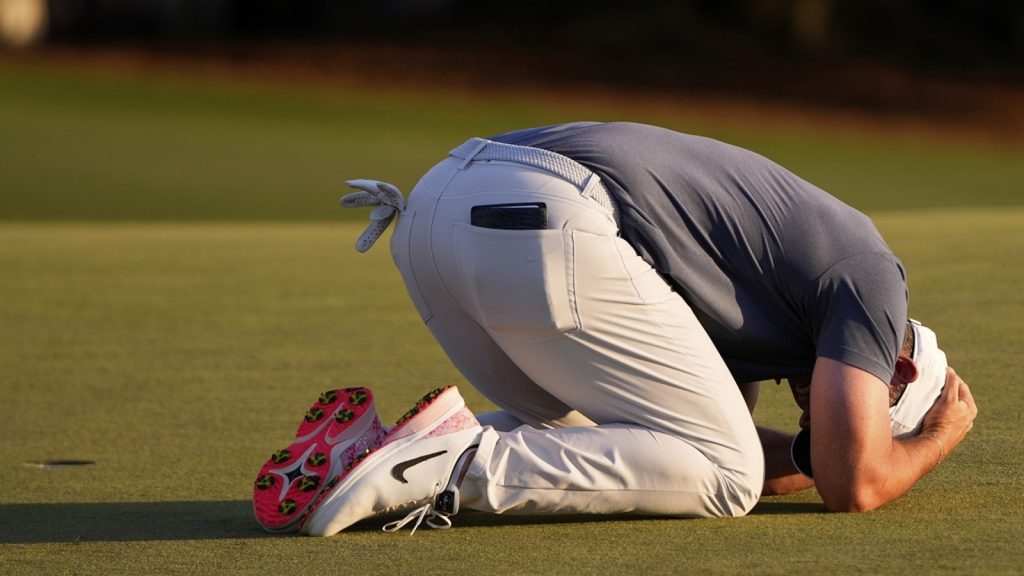 Rory McIlroy wins the Masters, beating Justin Rose on the first hole of a playoff to complete the career Grand Slam