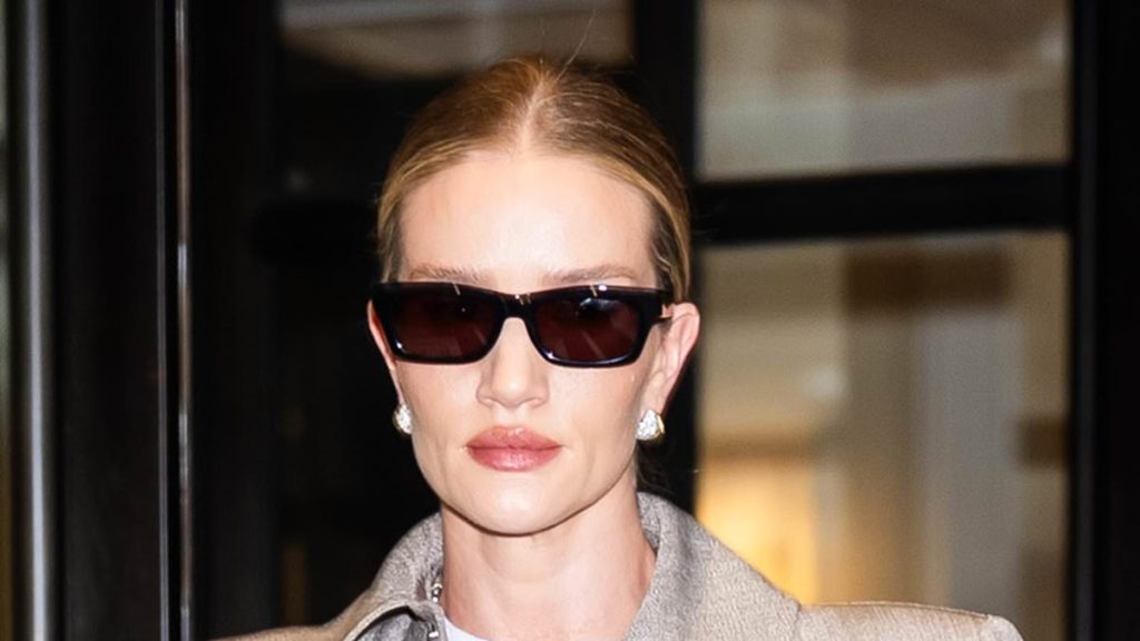 Rosie Huntington-Whiteley is the epitome of chic in a grey trench coat