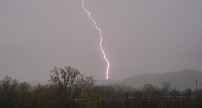 Lightning strikes as storms move through the area Wednesday, April 2, 2025, in Ashland City, Tenn.