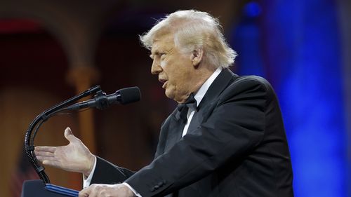 President Donald Trump speaks at the National Republican Congressional Committee (NRCC) dinner at the National Building Museum in Washington, Tuesday, April 8, 2025.