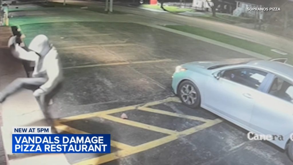 Sopranos Pizzeria in Lockport, Illinois; Vandals caught on camera damaging restaurant; owner offers free pizza as reward