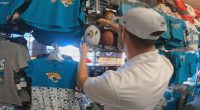 Sports store spends $30,000 on Travis Hunter merchandise