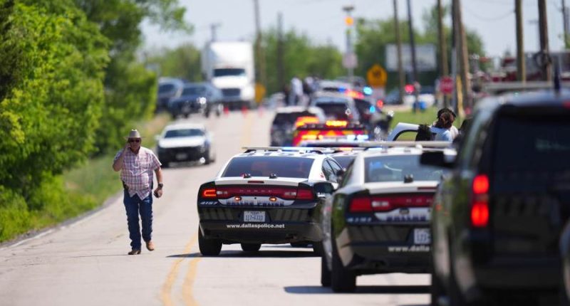 Suspect in shooting at Dallas high school is in custody, officials say