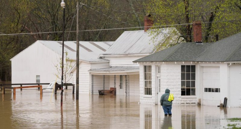 Swollen rivers flood towns in US South after dayslong deluge of rain