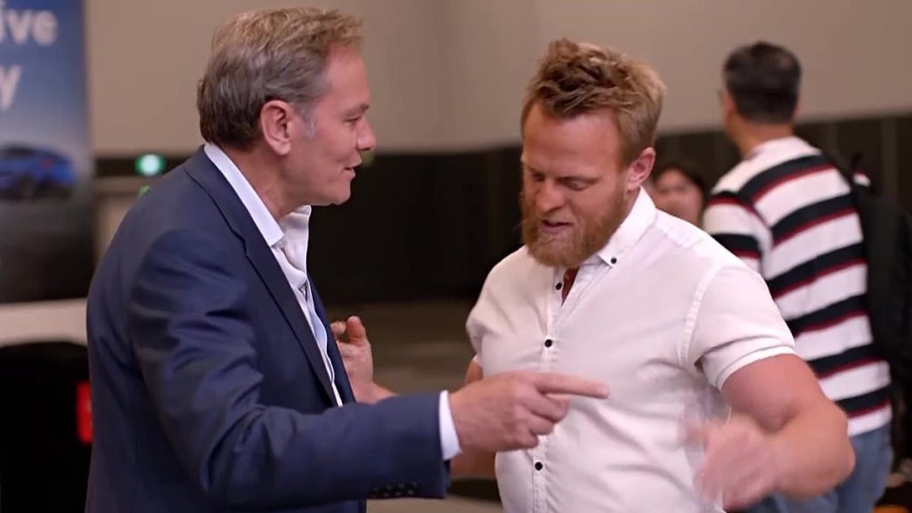 Tense moment Channel Seven star Liam Bartlett nearly comes to blows with an EV influencer dubbed the 'Electric Viking'
