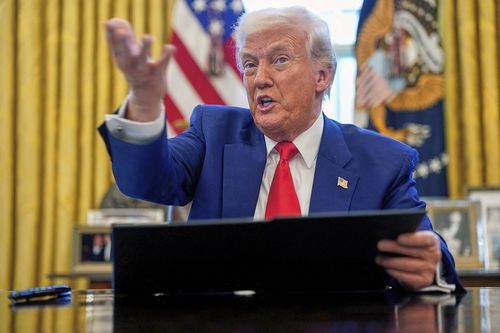 President Donald Trump speaks as he signs executive orders in the Oval Office of the White House Wednesday, April 9, 2025, in Washington. (Pool via AP)