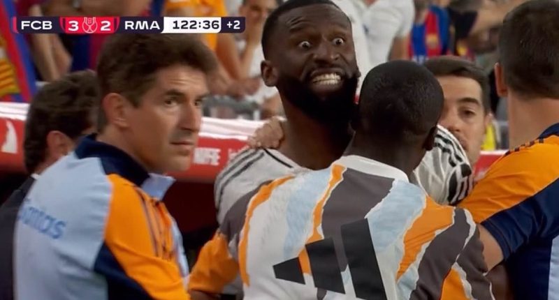 Three red cards, Jude Bellingham 'restrained' and an ICE PACK thrown at the referee: Real Madrid implode in Copa del Rey defeat by Barcelona - and Antonio Rudiger faces probe after meltdown