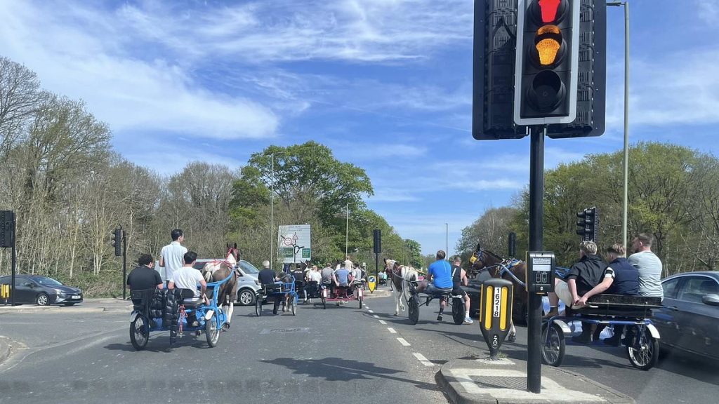 Travellers carnage sees footballers' millionaire neighbourhood locked down as up to 100 race horses through red lights, smash cars and trash pub in Surrey beauty spots