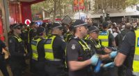 Clash between protesters in Melbourne's CBD