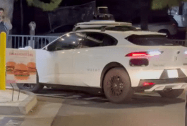 A Waymo driverless taxi got stuck in a Chick-fil-A drive thru in Santa Monica on April 7, 2025. (Chris Kellogg)