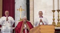 Pope Francis sits by the coffin of late Pope Emeritus Benedict XVI in St. Peter's Square during a funeral mass at the Vatican, on Jan. 5, 2023. (AP Photo/Andrew Medichini, File)