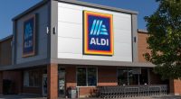 Aldi supermarket exterior with shopping carts.