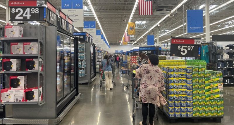 Shoppers in a Walmart store.