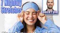 Close-up of happy beautiful asian girl in sleeping mask and blue pajamas lying in bed, smiling upbeat, having perfect mood as going bed and getting ready sleep, standing white background