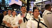 Military personnel at the New York Stock Exchange.