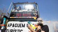 Anti-tourist mob attacks holidaymakers with water guns as they vow Spain faces ‘long hot summer’ of protest carnage