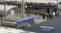 Police officers at a crime scene at Hamburg Central Station.