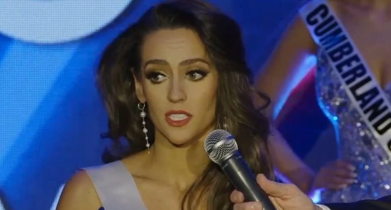 Bill Belichick, 73, sits with Jordon Hudson's dad as she gives speech