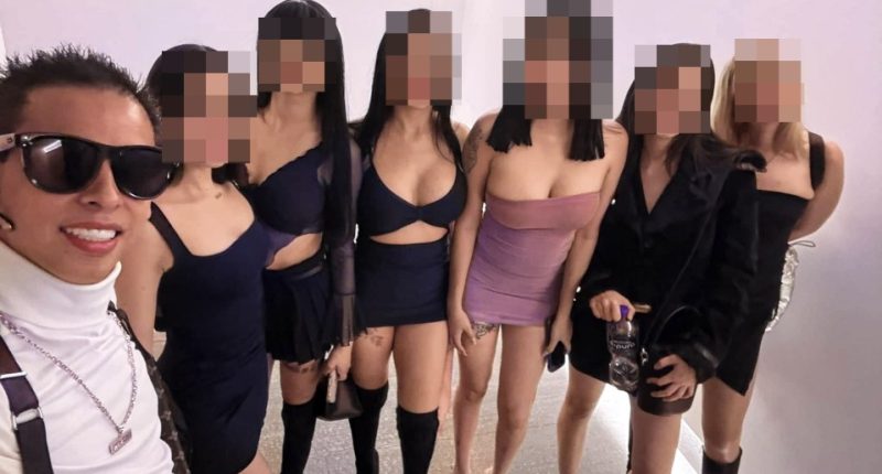 Photo of Alex Marin with several women; faces blurred.