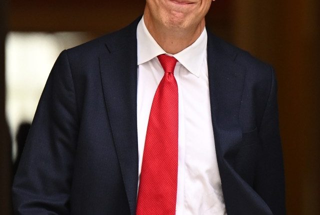 Ed Miliband, Energy Secretary, leaving Downing Street.