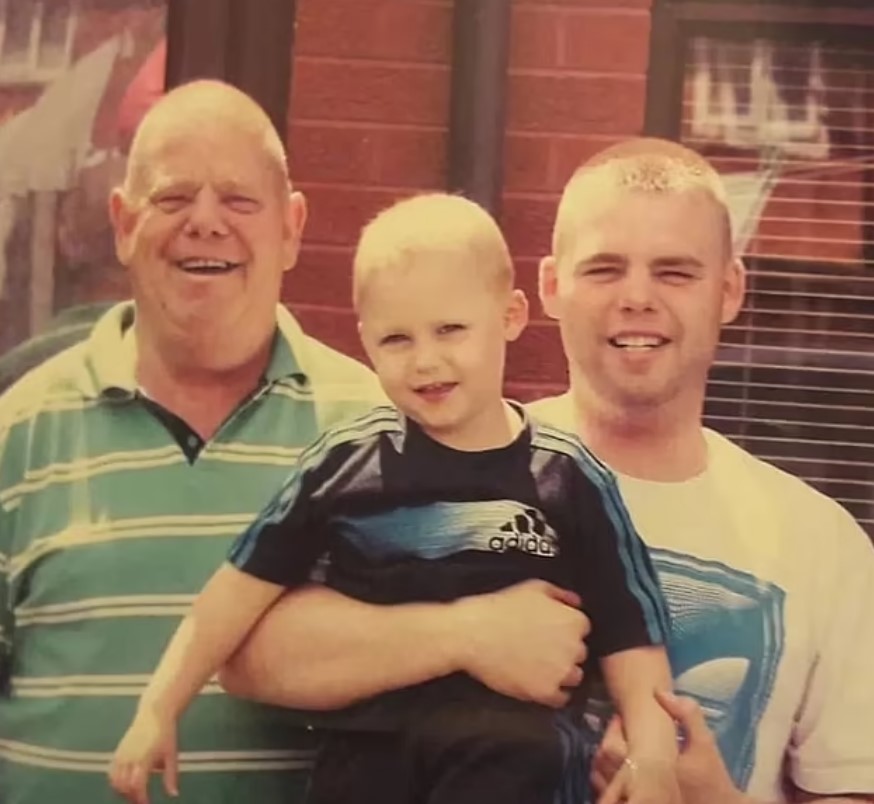 Photo of a grandfather, father, and son.