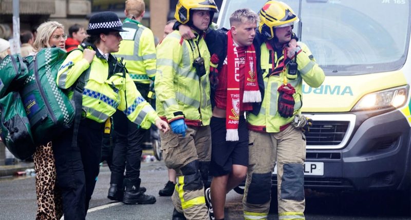 Driver arrested after vehicle plows into crowd of Liverpool soccer fans during celebration
