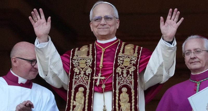Pope Leo XIV appearing on the Vatican balcony.
