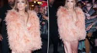 Jennifer Lopez suffers wardrobe malfunction in plunging peach gown