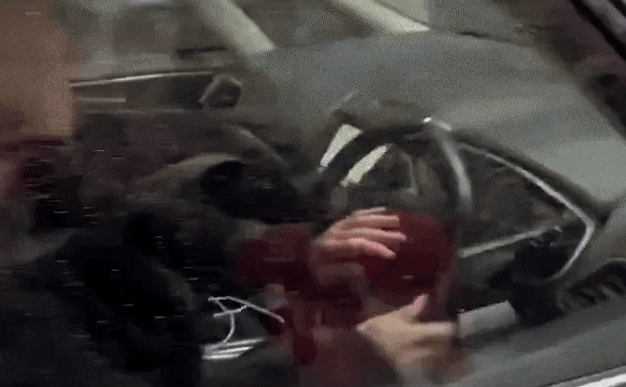 Person driving a car.