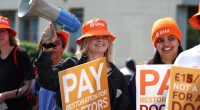 Junior doctors protesting for pay restoration in London.