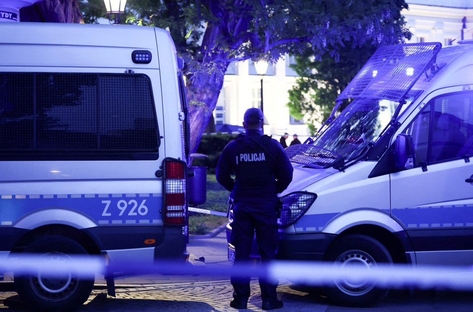 Polish police officers at a secured area.