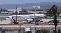 Hawaiian Airlines plane on tarmac after evacuation at San Diego International Airport.