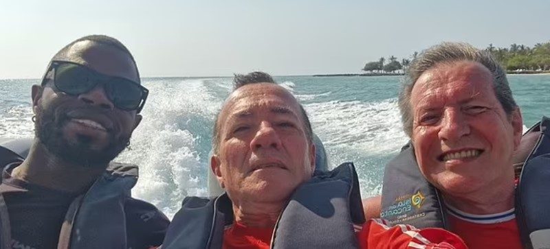 Three men on a boat.