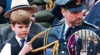 Prince Louis tugs on William's uniform at VE Day celebration with George, Charlotte