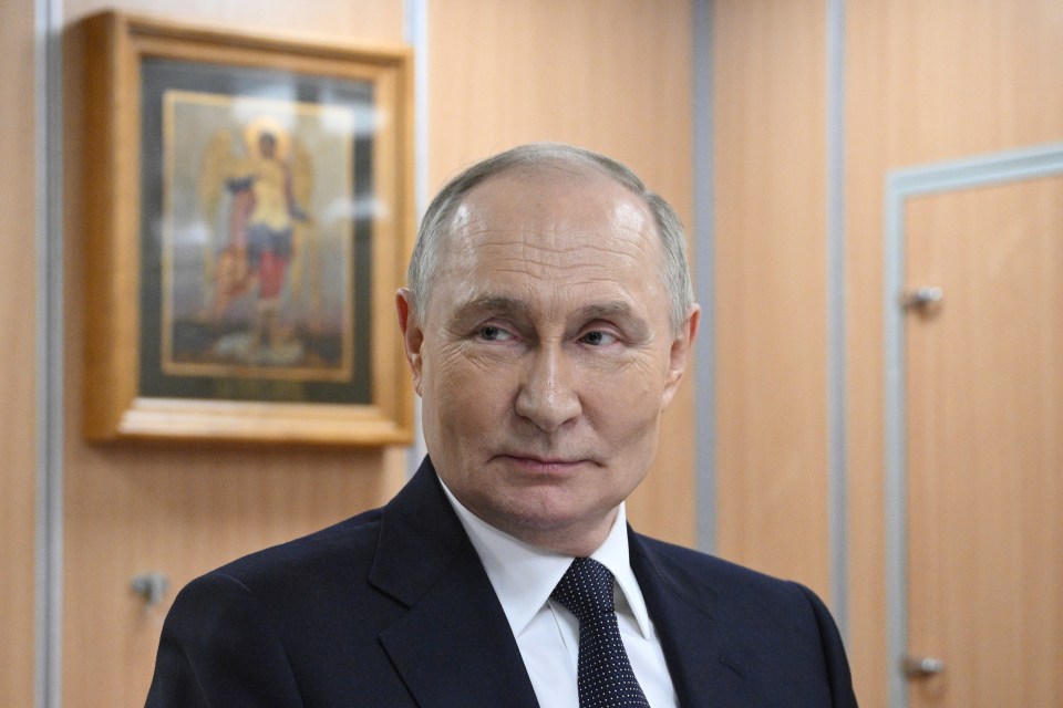 Vladimir Putin in a suit.