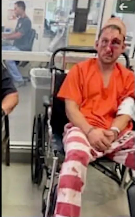 Injured inmate in wheelchair.