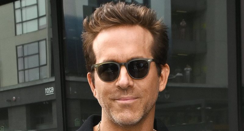 Ryan Reynolds is surprise guest at rock group's Walk of Fame ceremony