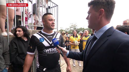 Jarryd Hayne speaks to Bailey Kenzie after his return to the rugby league field.