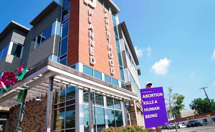 A Planned Parenthood affiliate plans to close 4 clinics in Iowa and another 4 in Minnesota