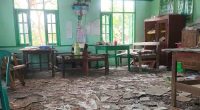An airstrike in central Myanmar kills up to 22 people at a bombed school, reports say