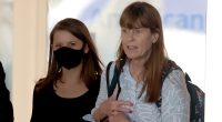 Bindi Irwin holds onto mother Terri as she lands in LA after surgery