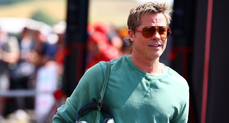 Brad Pitt gives young fan the shock of her life as he pulls up to her McDonald's drive through window in New Zealand