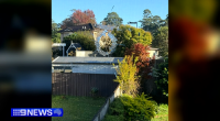 A bullet pierced the window of a Sydney home, a kilometre away from a drive-by shooting in the next suburb over.
