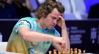 Chess grandmaster Magnus Carlsen is forced into a draw in a showdown against ‘the world’