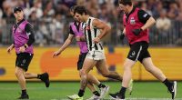 Concerned Darcy Moore blasts AFL umpires for choosing not to stop Collingwood's clash against Fremantle after horrific collision: 'It didn't feel right'