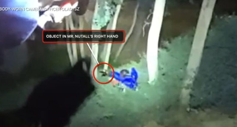 Dad shot by cop as he held baby under arm headed to prison