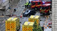 Driver detained after car drives into crowd at Liverpool parade