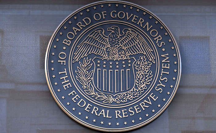 Federal Reserve official sees signs of slowing economy but not ready to cut rates