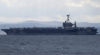 Aircraft carrier USS Harry S. Truman is moored near Split, Croatia, Feb. 14, 2022. (AP Photo/Darko Bandic, File)